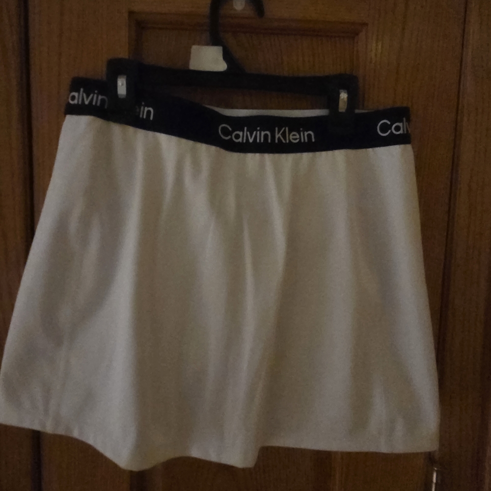 Calvin Klein White Athletic Skirt w/shorts under,black band beautiful Condition!